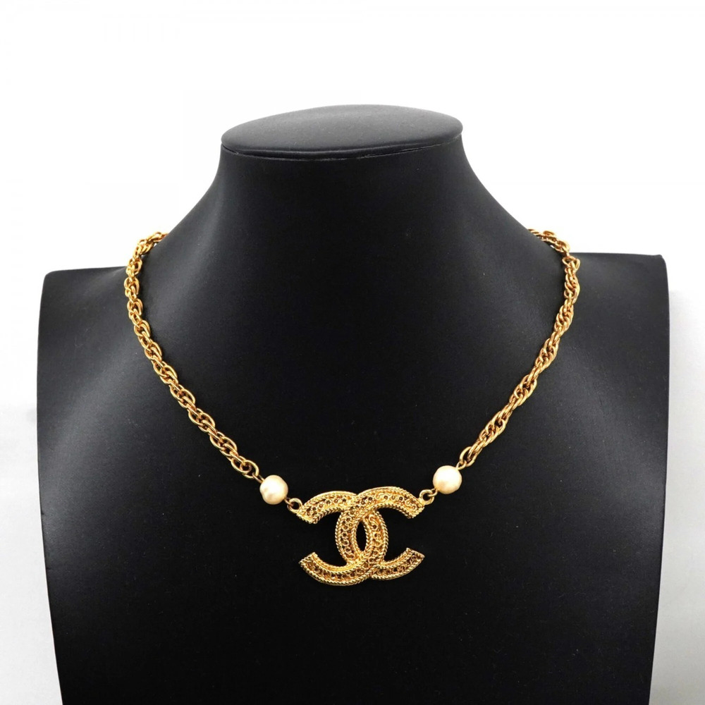 CHANEL Gold Pearl Logo Necklace - Picture 6 of 8